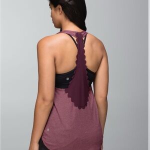 Lululemon 105 F Singlet *Laser-Cut
Heathered size 12 Pre-Loved